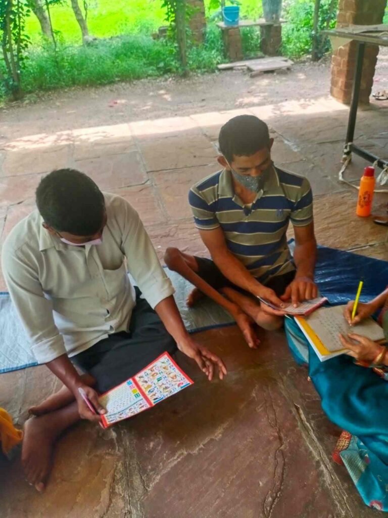 Gabbu and Lakhan Bhaiya Studying - Samaj Pragati Sahayog - SPS